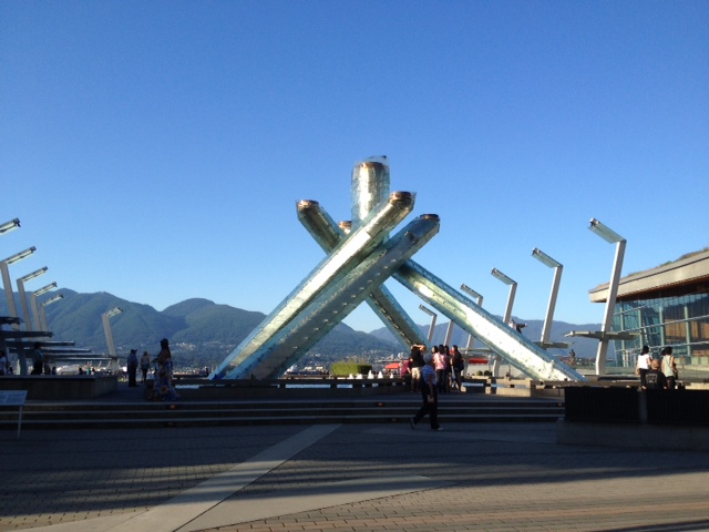 The 2014 Vancouver Olympic torch. Your view acorss to North Vancouver while on the patio at Cactus Club Coal Harbour. 
