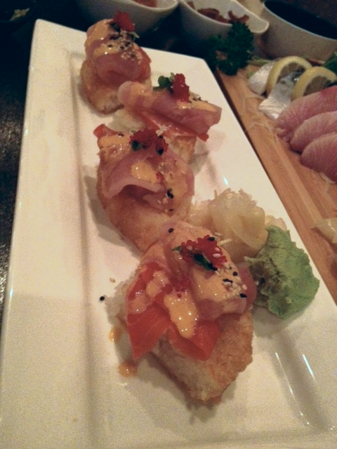 Their pizza sashimi appetiser is awesome - fresh salmon and tuna sashimi on top of "toasted rice!" (누릉지밥!)
