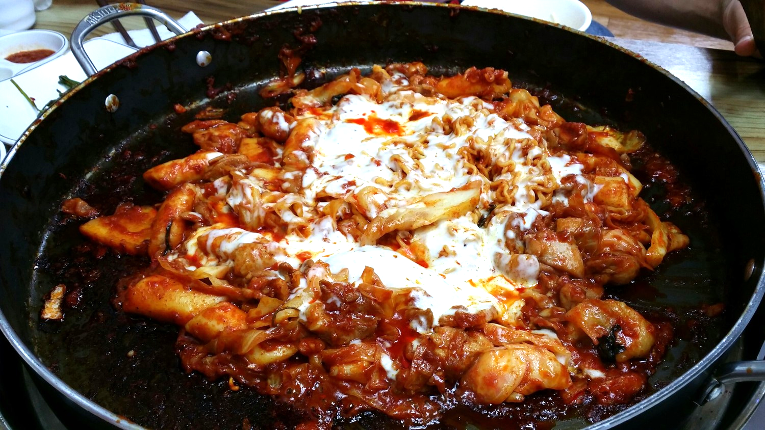 I like to ask for the cheese on only half of the dish so you can have both flavours. This place won't let you eat the chicken until everything is really well cooked - so keep stirring so the food doesn't stick, until they say you can eat!