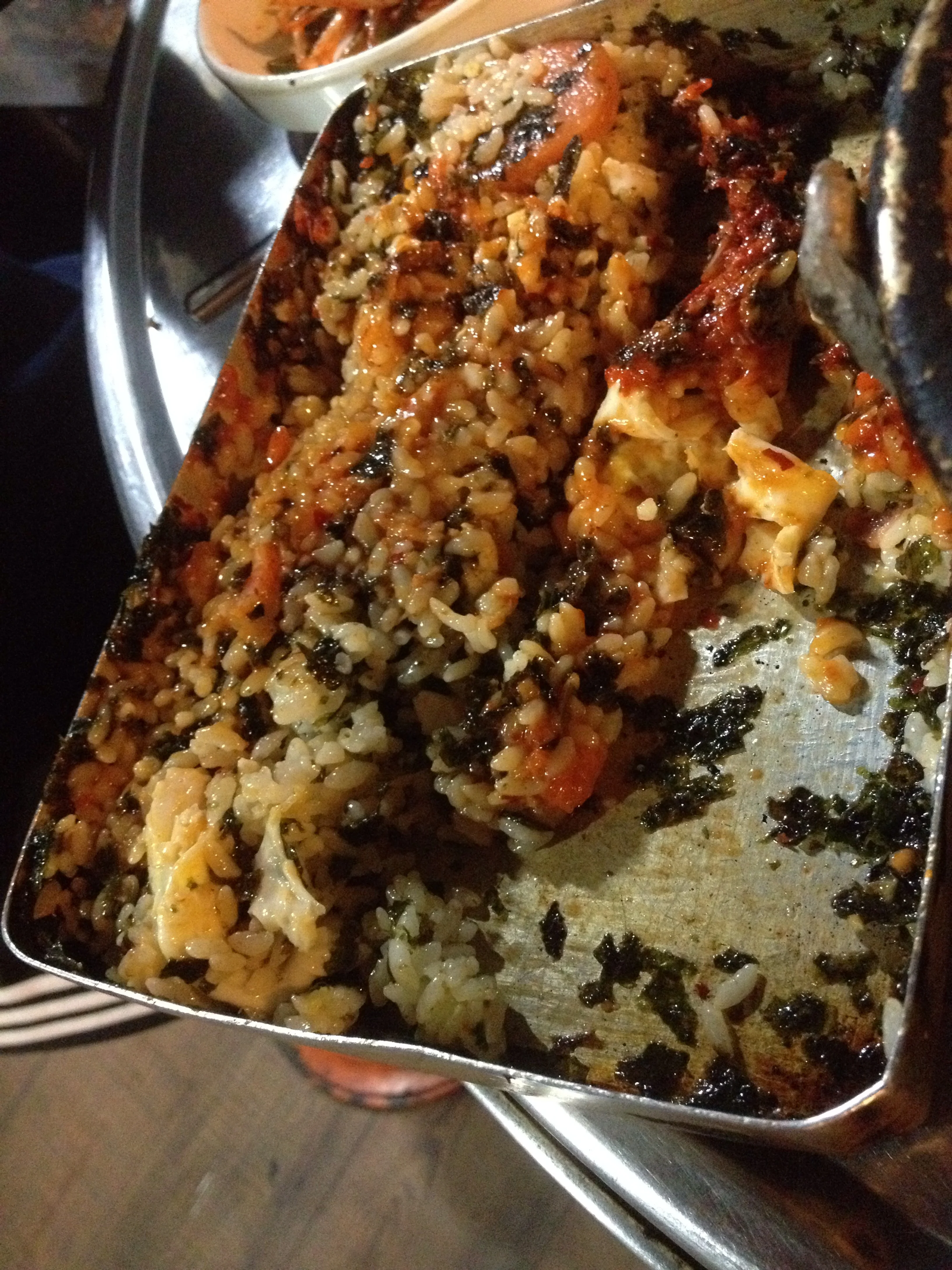 The 도시락 (doshirak) - old school rice box with filled with rice, spam, seasoned seaweed, egg and spicy sauce. It comes shaken up all together (which they do for you too!) and then it is all mixed up ready to eat! You can place the tin box right on top of the grill to heat it up and it is delicious!