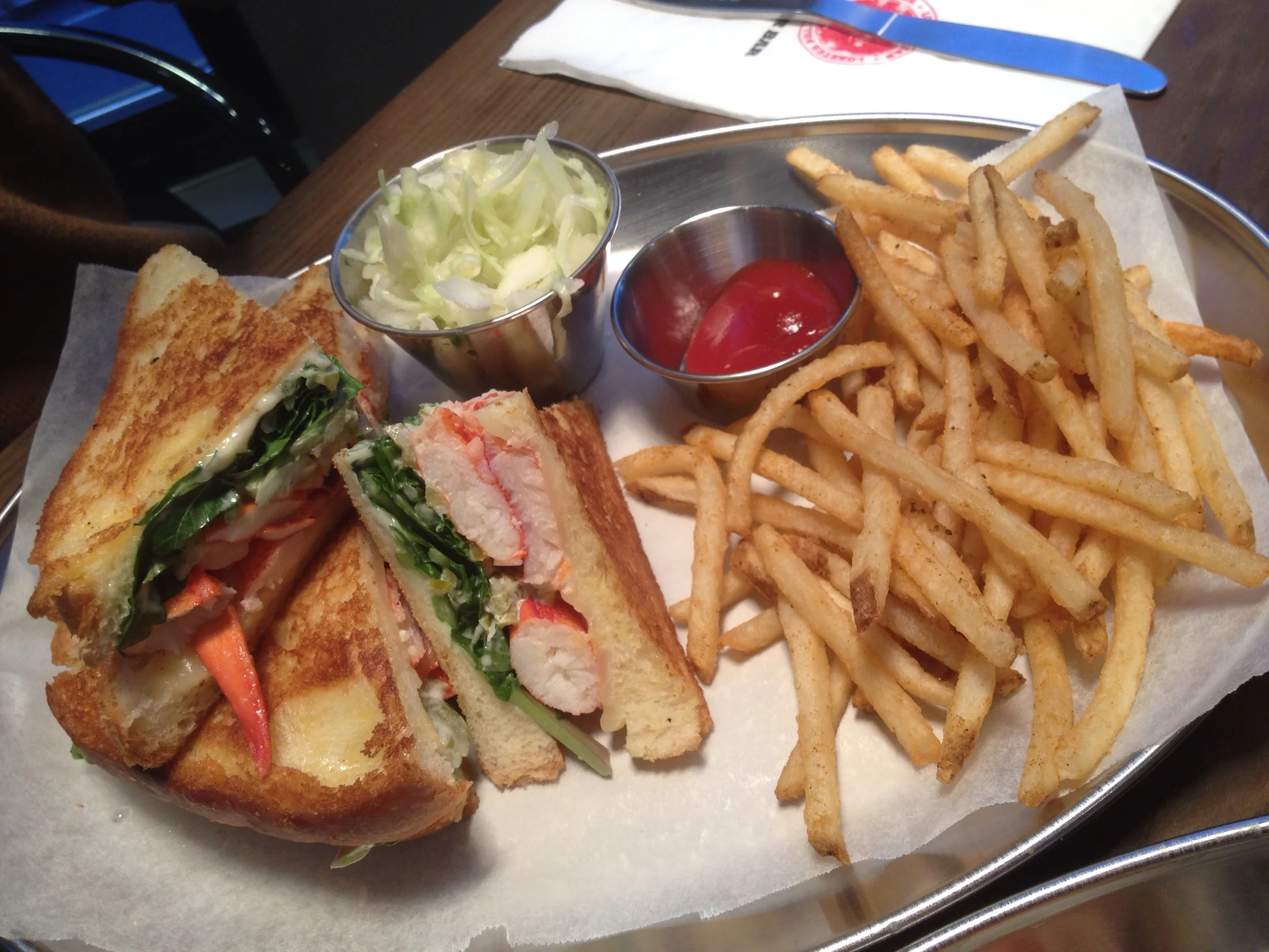 Lobster Grilled Cheese - "Lobster chunks, american and gouda cheese, arugula, lobster bar seasoning, served with fries and salad" Delicious - make sure to eat this when it's served hot right away. The crunchiness of the toasted bread and arugula contrasts so nicely with the soft lobster meat and gooey cheese. 