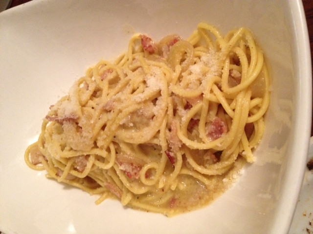 The original carbonara - made with just egg yolks, bacon, onions topped with fresh grated cheese on top. 