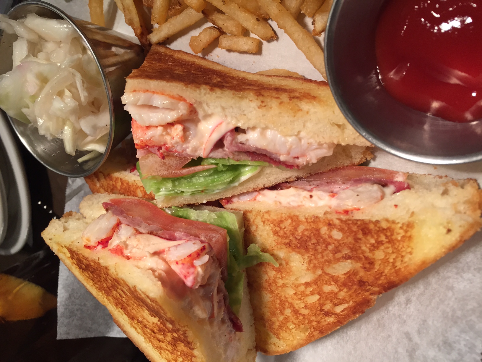  I think I would great as a BLT club sandwich - to sandwich the ingredients with another piece of bread to add a different layer and texture when eating. It would also just be a nice change looks wise for differentiating between the grilled cheese and BLT. I personally love the ingredients of the grilled cheese so that is my preference (but remember, I don't like bacon/samgyupsal) . A close-up view of the BLT...