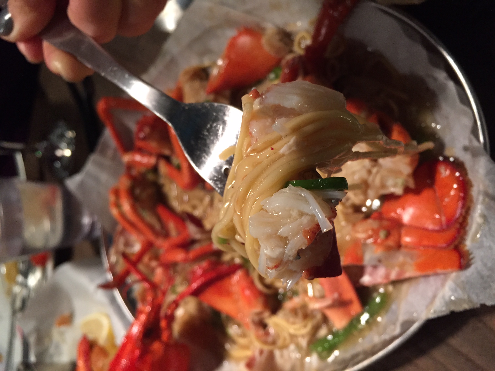 Make sure you swirl up noodles, a piece of veggie and a nice chunk of lobster with each bite! 