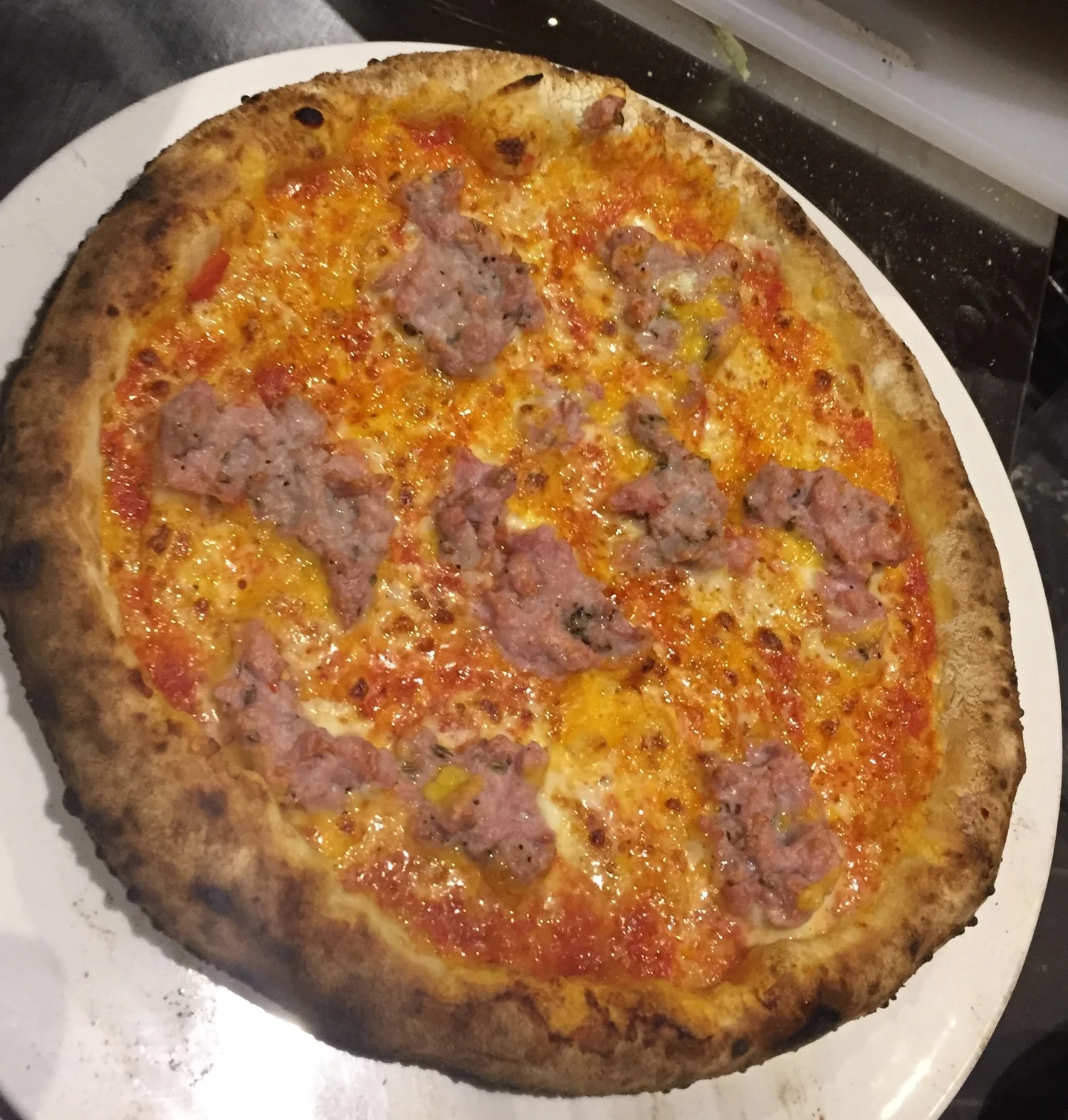 My friend tried this kind last time - the STRONG MAN (for two) - "The Springs in-house made Jeju black pork sausage infused with strong man ale roasted fennel seed cheddar, mozzarella cheese and tomato sauce. Didn't try it, but looked good. I liked the sound of the ingredients on the last pizza and want to try the JEWISH MAN next time!
