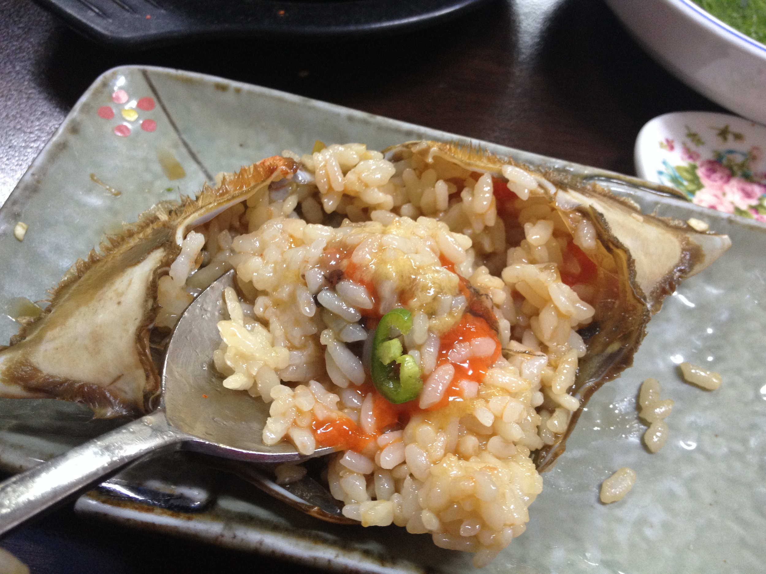 The best part (next to sucking the body of the crab meat off of the tip of the legs)...is mixing rice in the shell with the crab roe! Make sure you get all the insides scraped out from the corners of the shell! Wrap this in a piece of seaweed and enjoy - DELICIOUS! 
