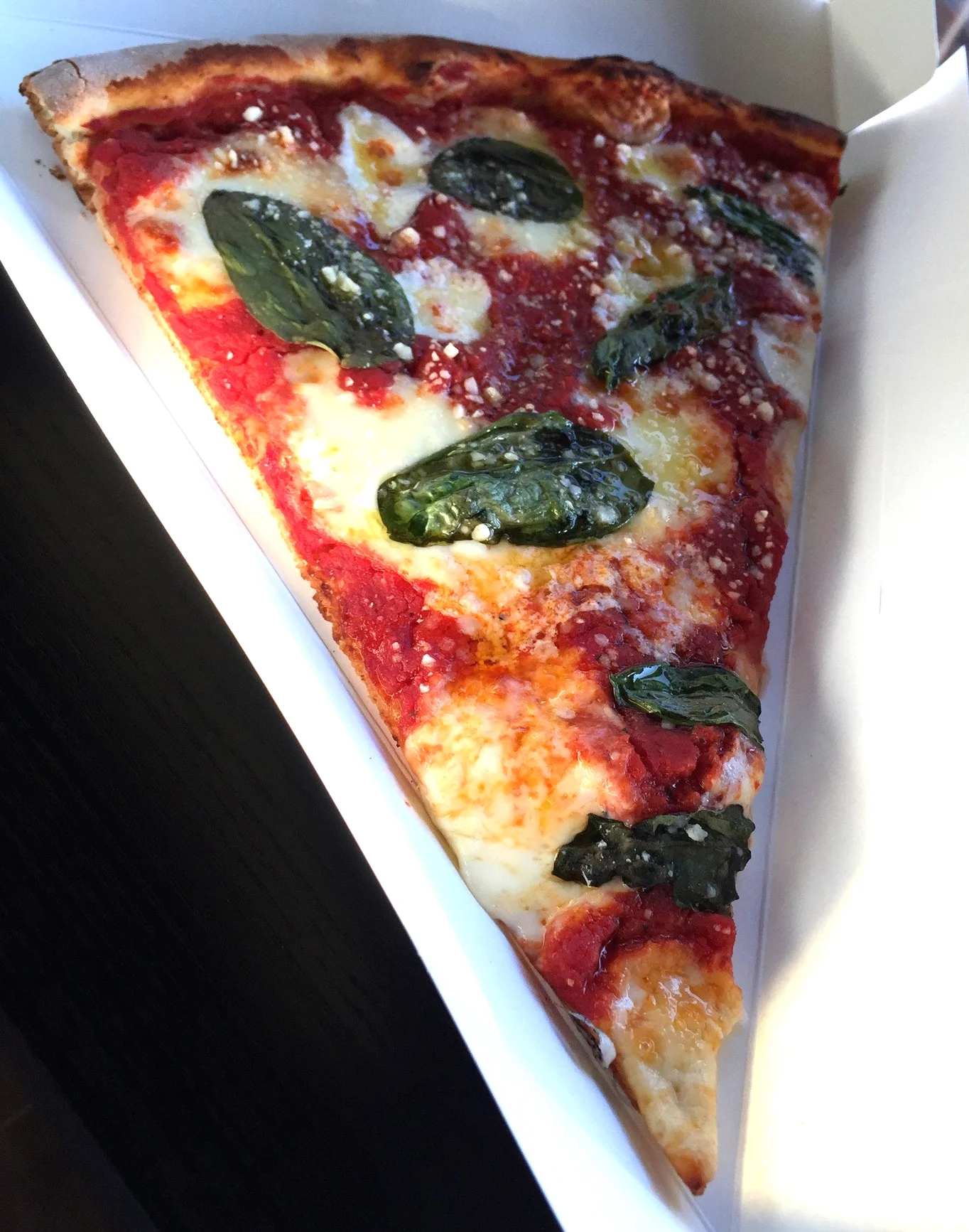 Classic Margherita at 6700won a slice: m y favourite. The picture looks small, but it could be cut into two slices and is large to hold in one hand. It is a decent size for the prize and the quality of cheese, amount of fresh basil and ratio of tomato sauce to the crispy yet chewy crust was perfect for me!