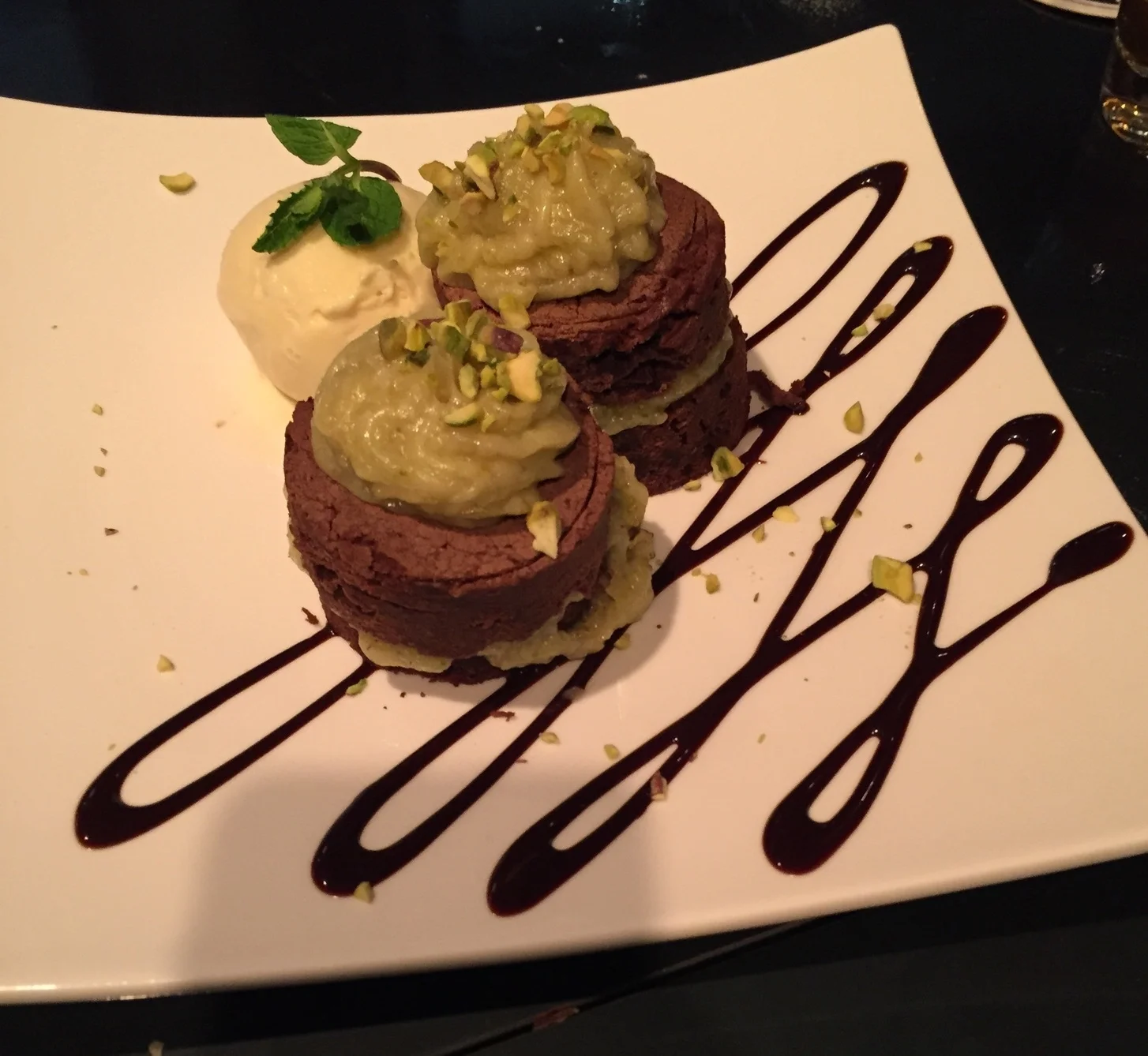 The dessert menu comes on a separate menu, but we tried the BROWNIE WITH PISTACHIO CREAM and vanilla ice-cream with a chocolate drizzle. Beautiful presentation and a nice sweet treat to finish off our feast. The brownie is not as chocolatey and rich as some, but it worked nicely with the pistachio cream and of course what brownie doesn't go well with ice-cream a la mode! They also have mini cheesecakes on their menu but didn't get a chance to take a snap of that!