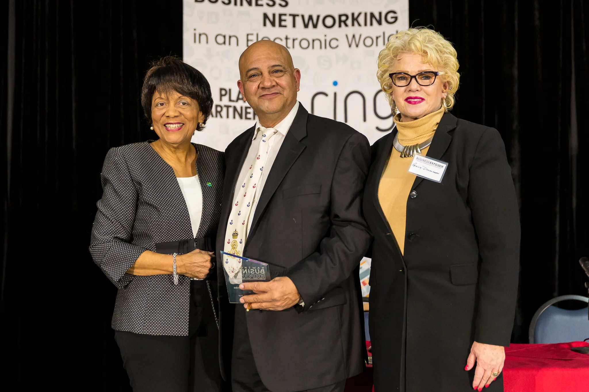 Olivia Valentine and Pat Donaldson with Business award recipient