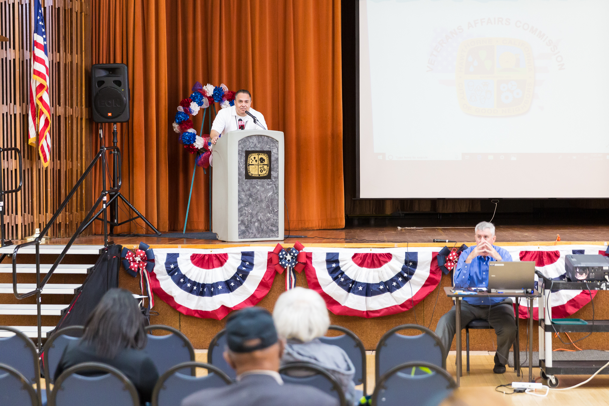 Mayor Alex Vargas at the podium