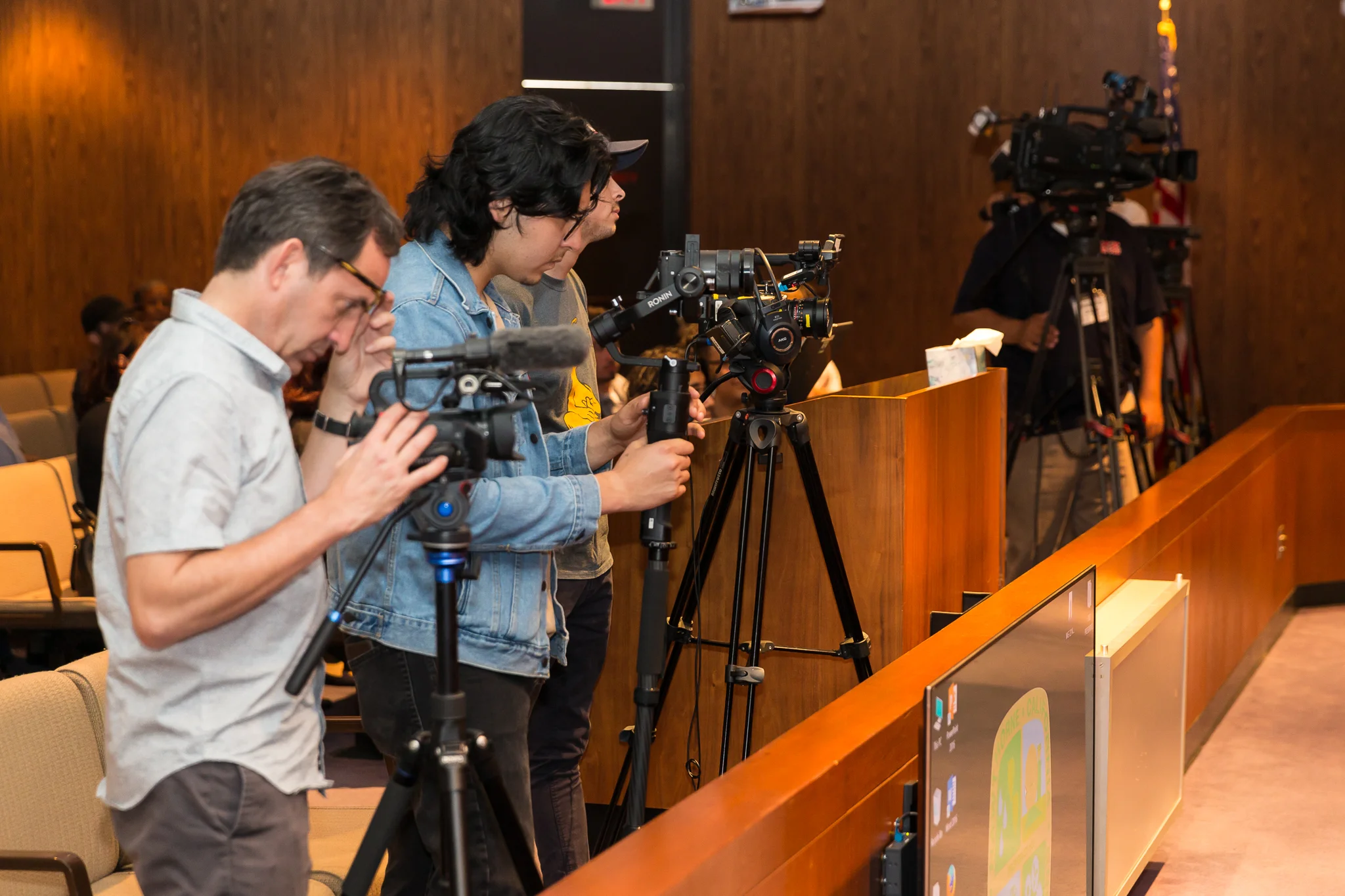 Reporters filming