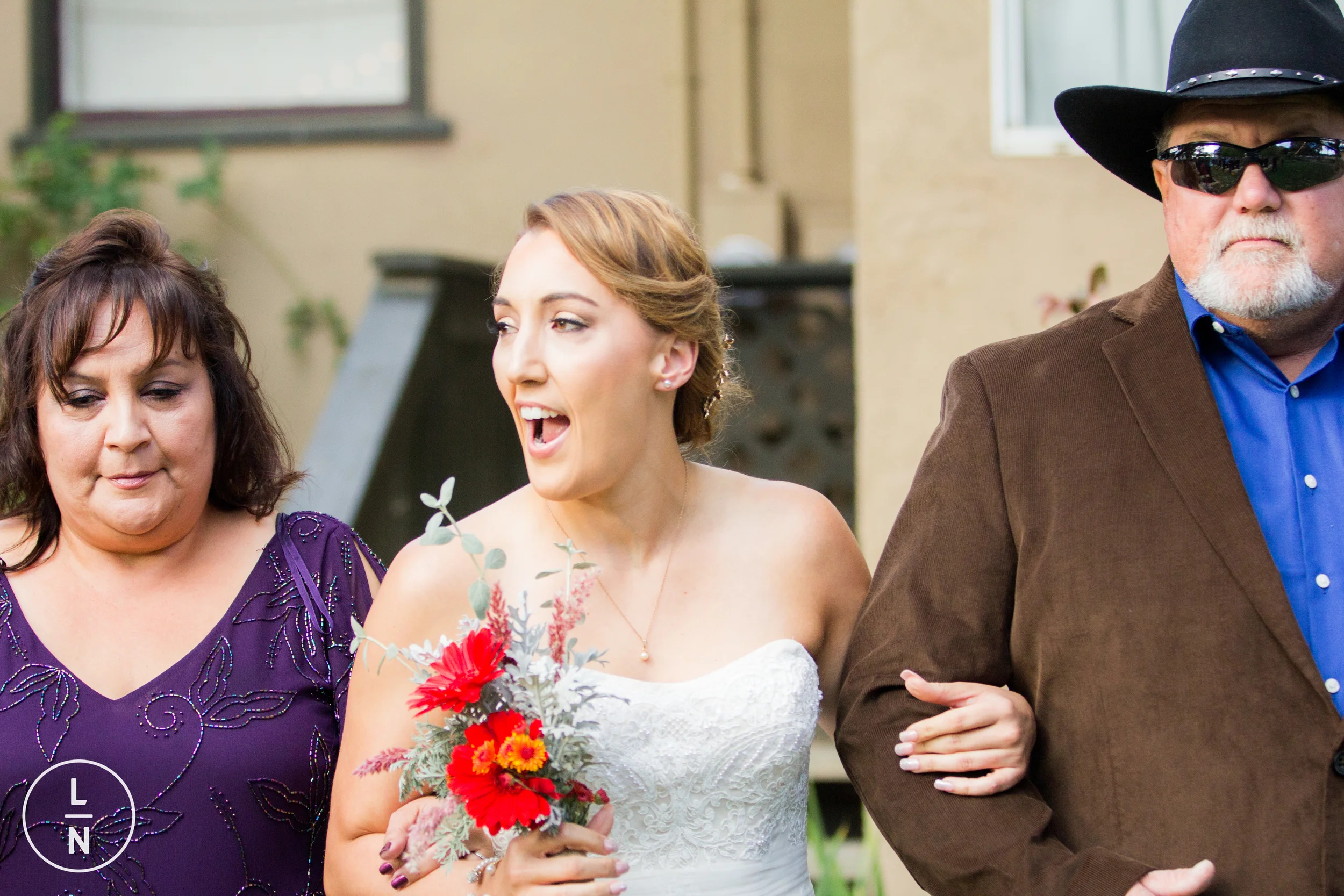 I asked Dana what she was most excited about, she said "Seeing Stacee dressed up and in her dress." Obviously Stacee did not disappoint. Love this look of surprise and love Dana had when she saw her.