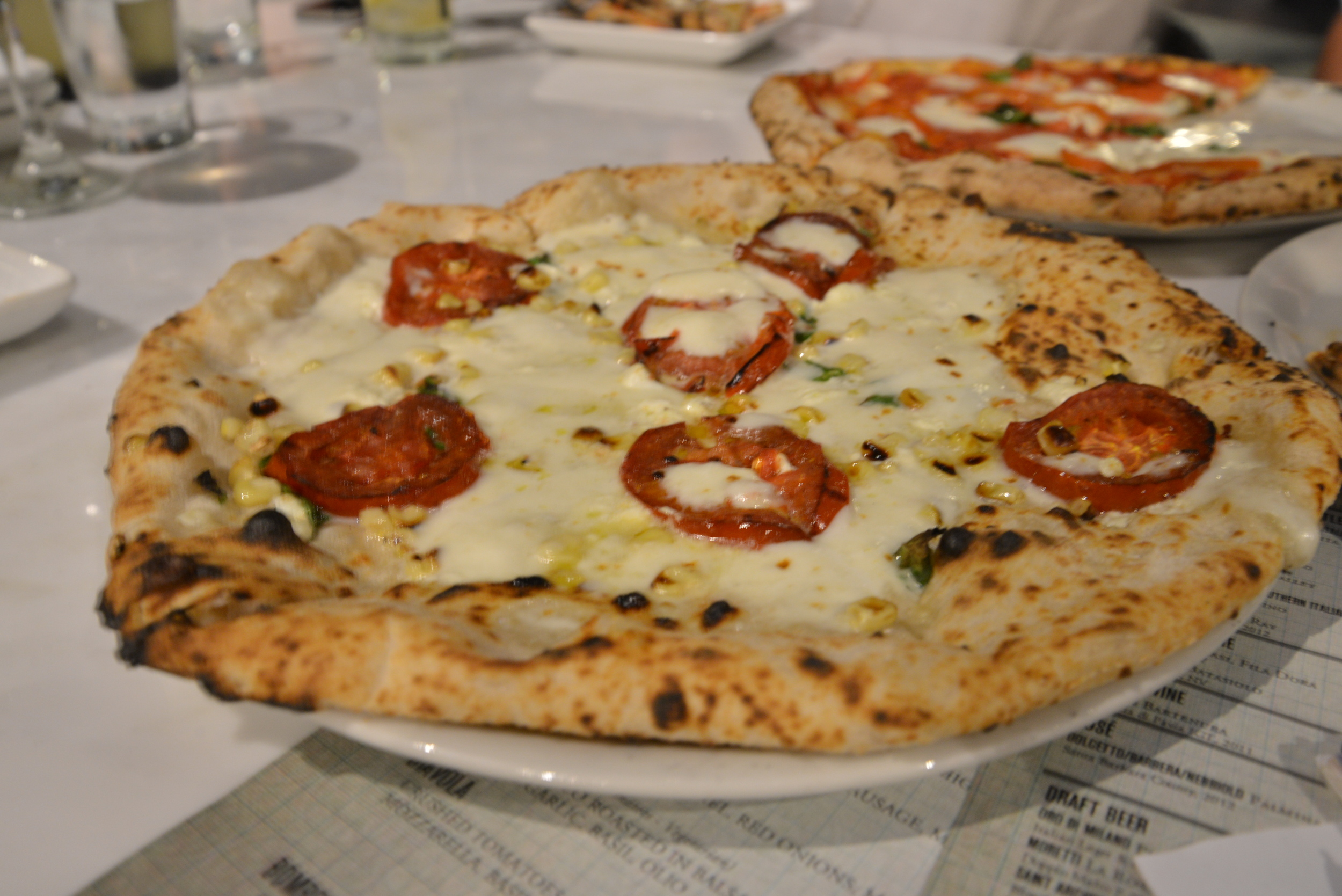   Corn and goat cheese give Settebello's Umbria pizza ($14) a nontraditional twist./ HEATHER GOLDIN, STAFF&nbsp;  