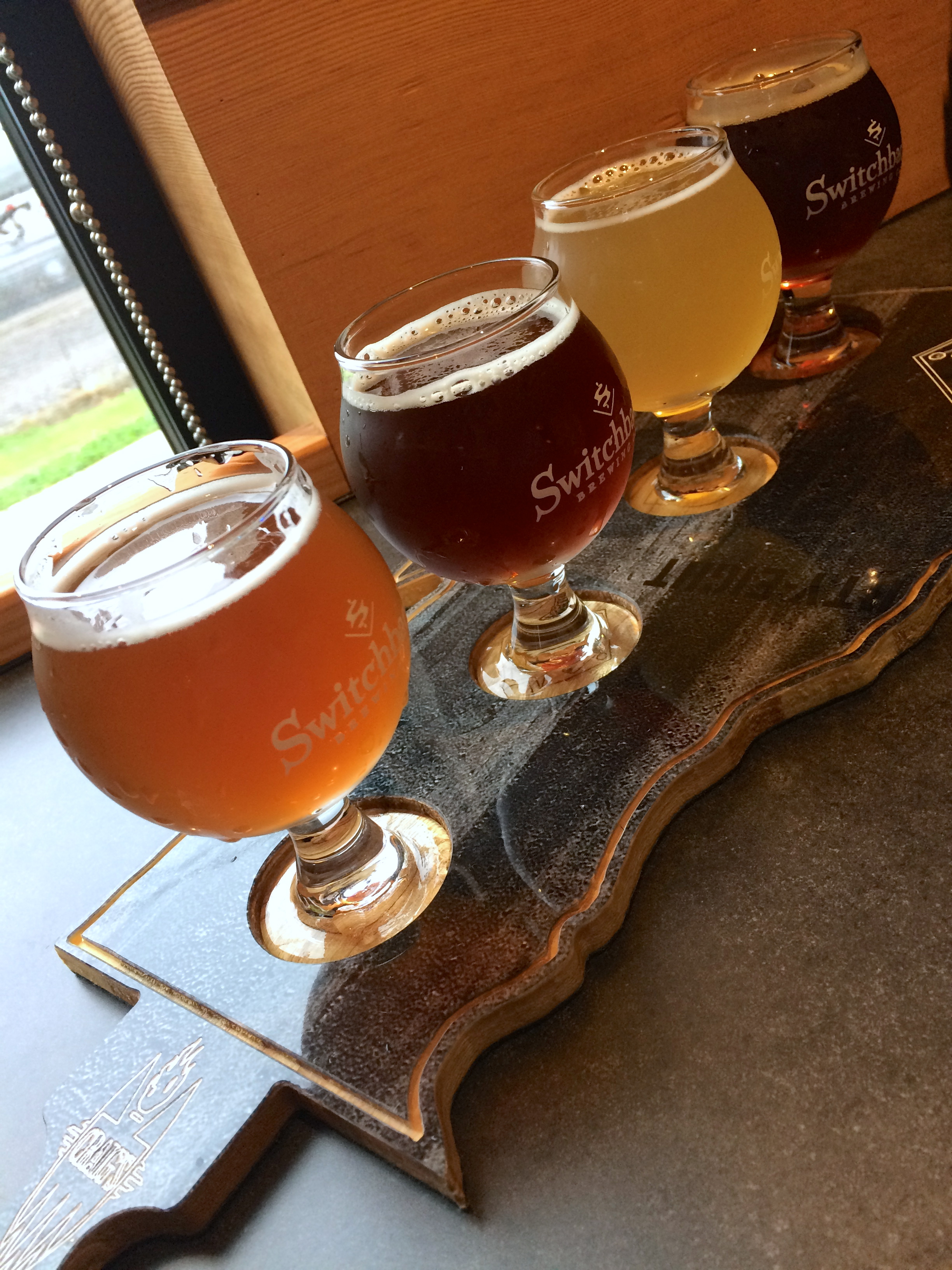 Visiting the new tasting room at Switchback Brewery. We were told to sample from the bottom of the state to the top: the classic Switchback Unfiltered Ale, a new Brown Ale, a new Citra Pils, and a Roasted Red Ale. The classic will always be my favorite.