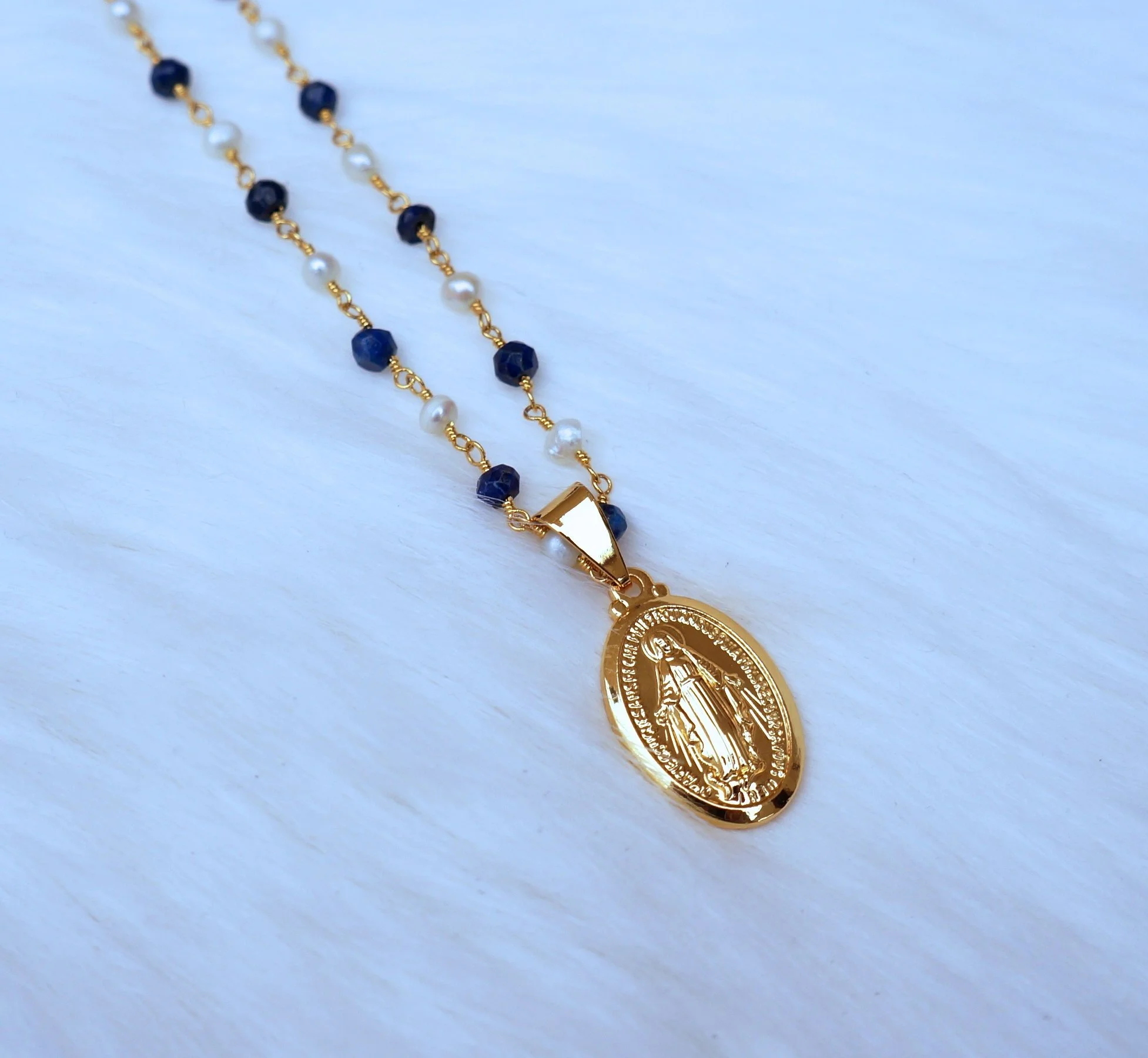 blue virgin mary necklace