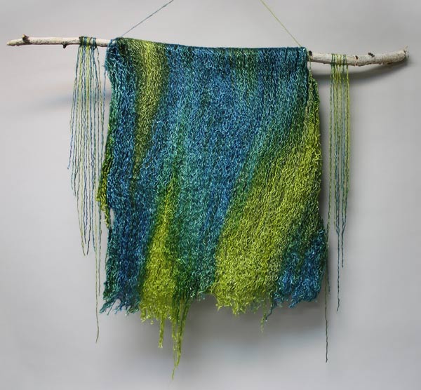 This felted piece of silk yarn and roving is called CASCADE. The shimmery silk adds to the wet look of the piece. This was part of the 2016 All Guilds Show at the AGB April, 2016. $650