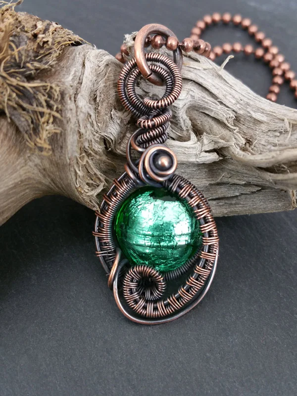 Angie’s exquisitely hand wrapped copper wire pendant.