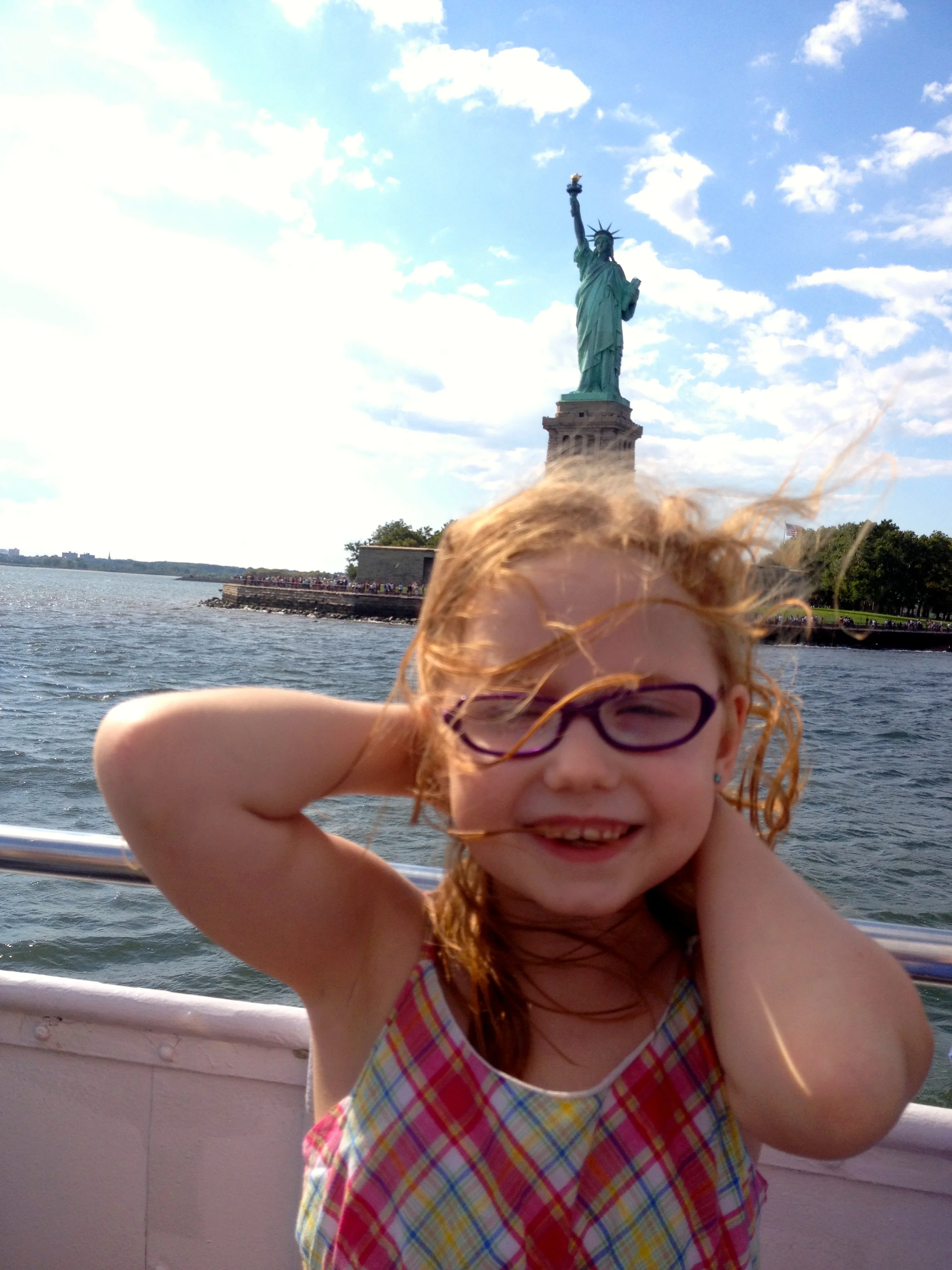 John thought it was great fun to try to get photos with Lady Liberty on people's heads.
