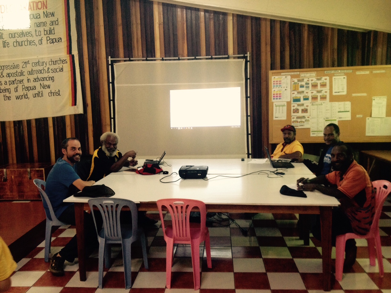 This is Adam Boyd next to Manius, his lead co-translator, and the rest of their translation team. Our first stop was at the Boyds' village near Wabag, a relatively large city for PNG. If my memory serves true, they were working through a passage in 1 Corinthians when we stopped by to see Adam's team and work space.