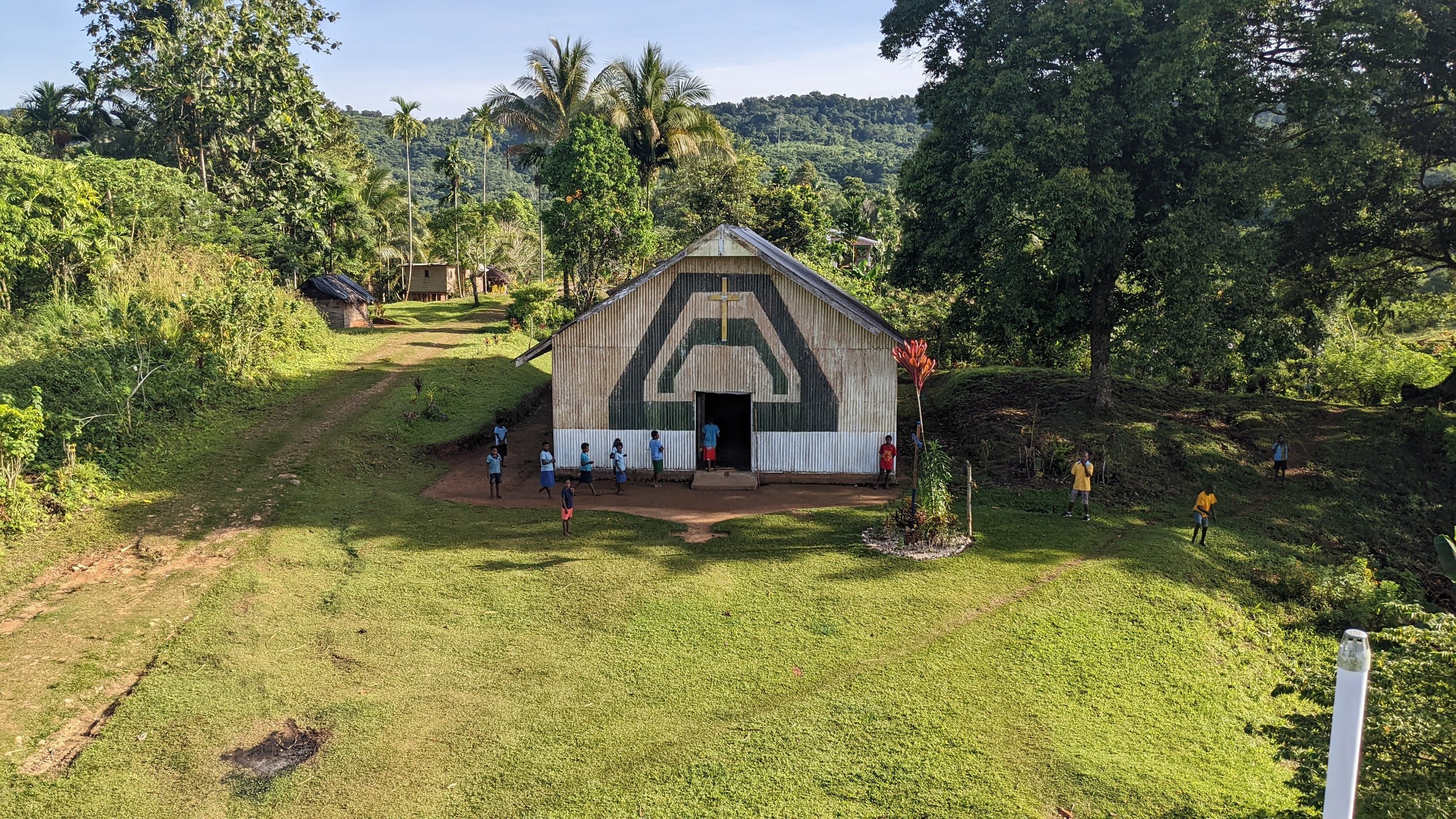  The next few pictures should give you some context. The local church is behind the house. Most of the village (that I’ve seen) trails off in front of the house. 