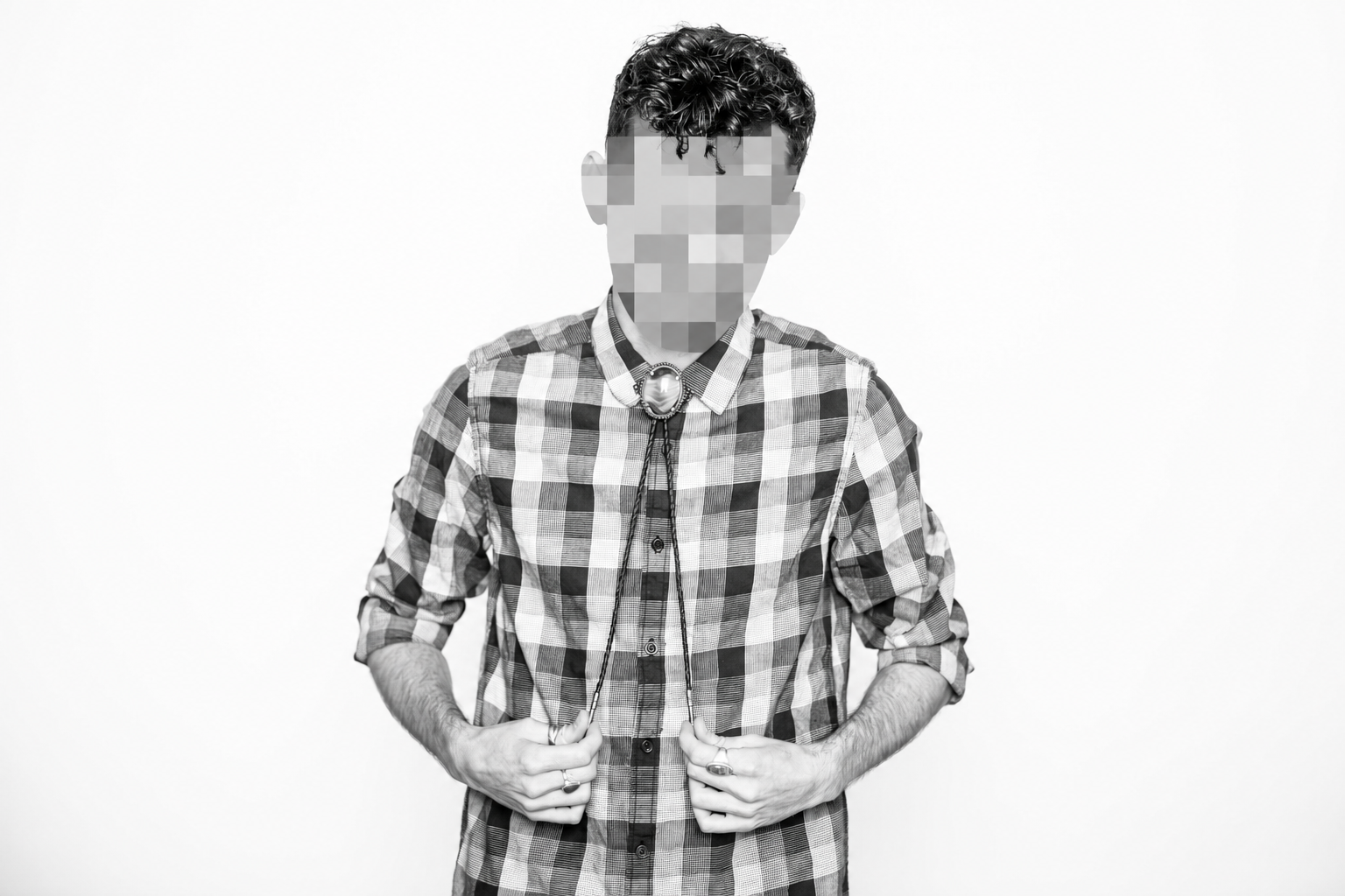 Black-and-white portrait with pixelated faces-2.png