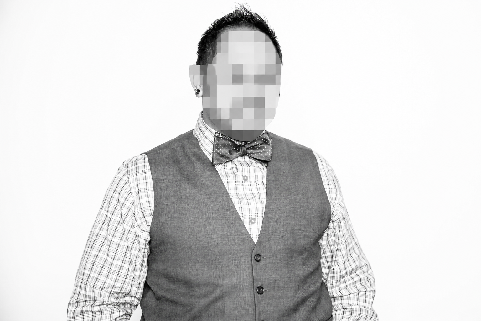 Coarse mosaic faces in black-and-white photo-1.png