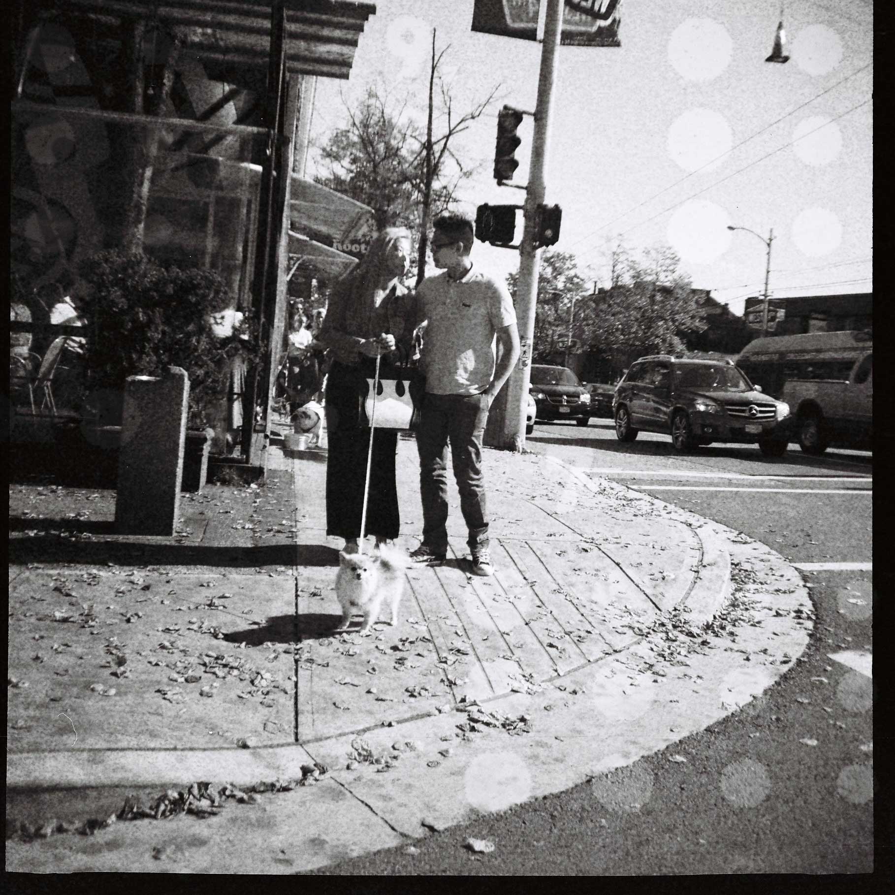 Kits couple with dog West 4th Ave., Vancouver Diana F, 120 lomo film 3.15 