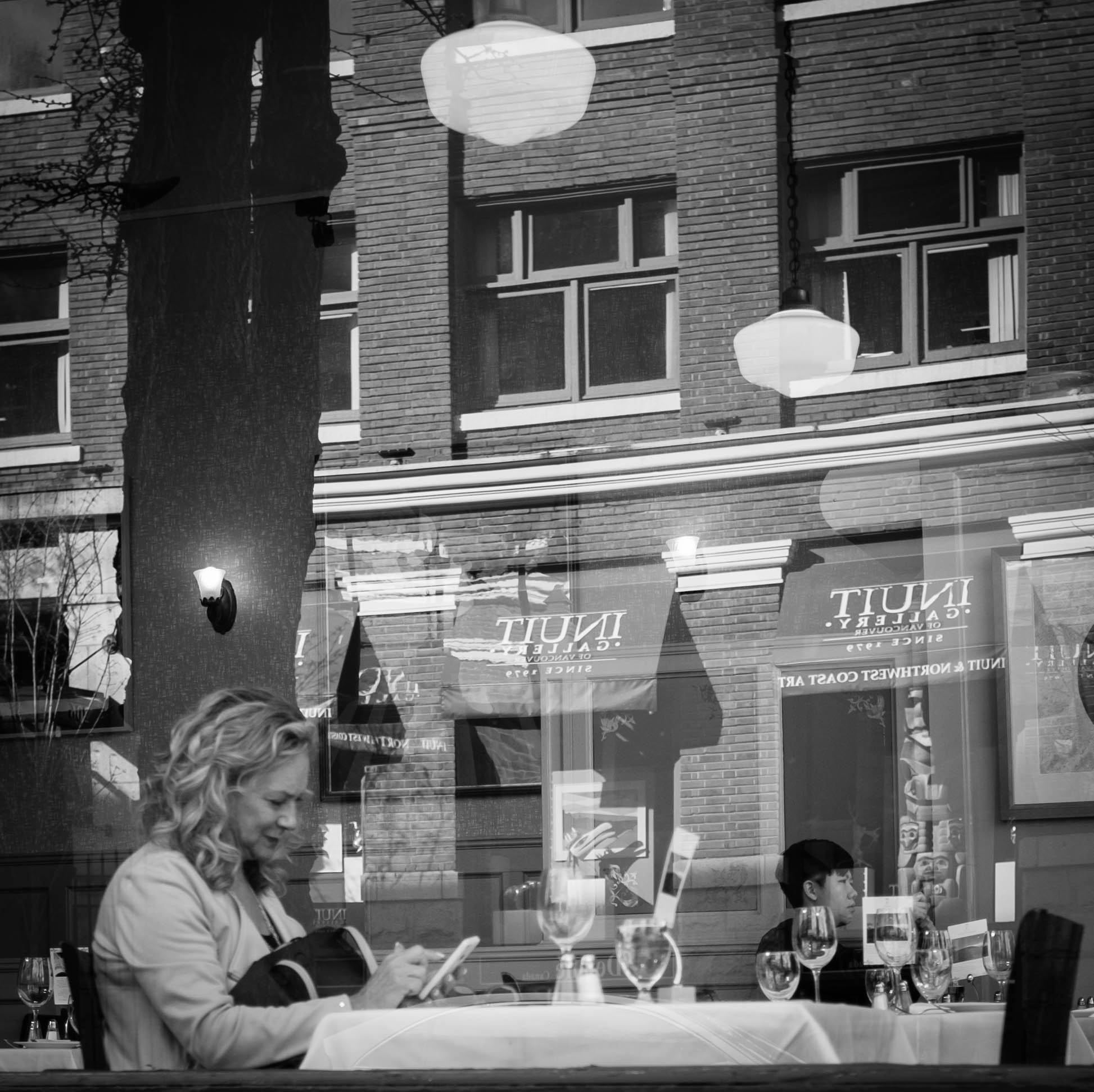  Woman in window with reflections Gastown, Vancouver Fuji X100T 3.16 