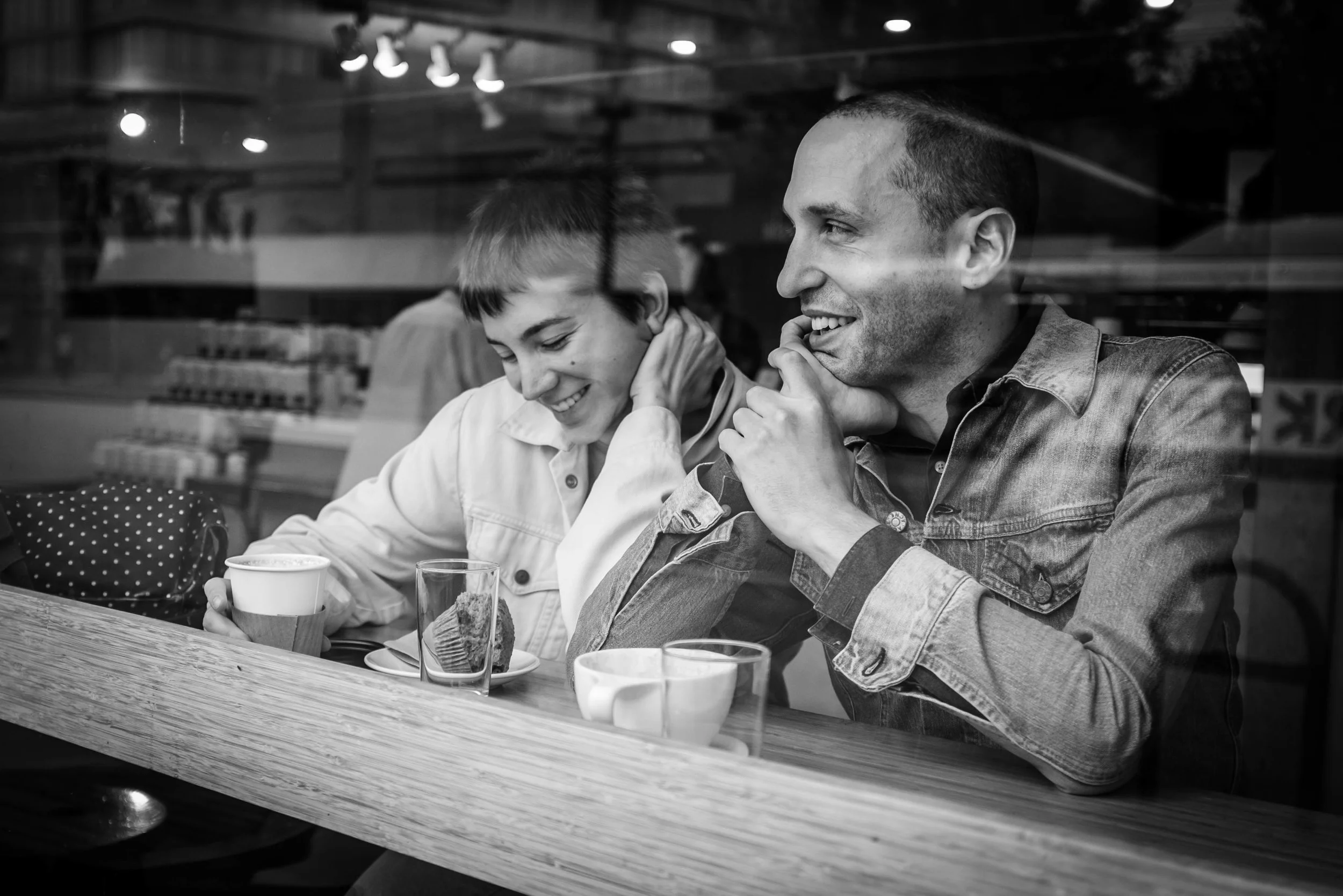 Couple in window Elysian Cafe, Vancouver Fuji X100T 8.16 About this photo