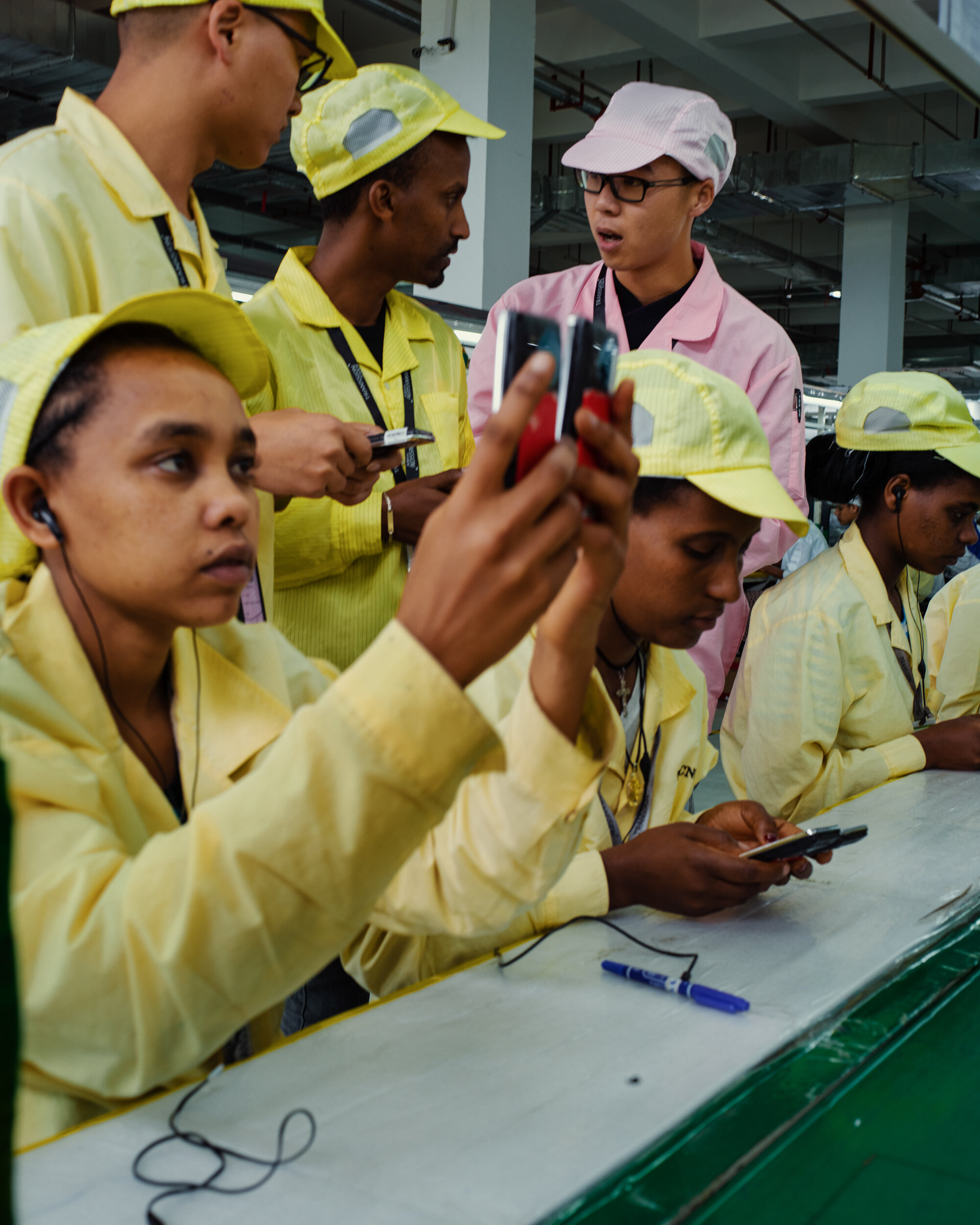  Ethiopia, October 2019. Local and Chinese workers inside the Tecno Mobile Factory in Addis Ababa. *** Tecno Mobile is a Chinese mobile phone manufacturer based in Hong Kong. In 2008, the company stopped doing business in Asia to exclusively focus on