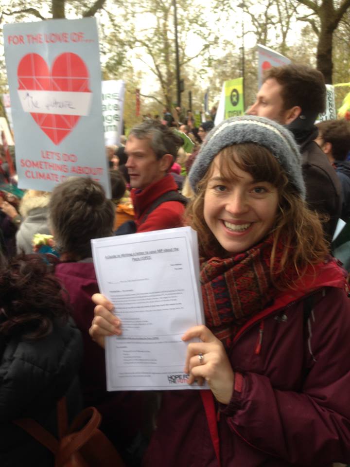 Jo handing out guides to writing to your MP.