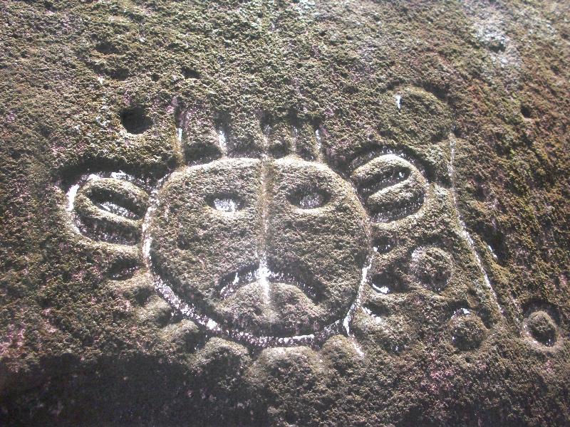 Ancient Rock Carving of Sun God