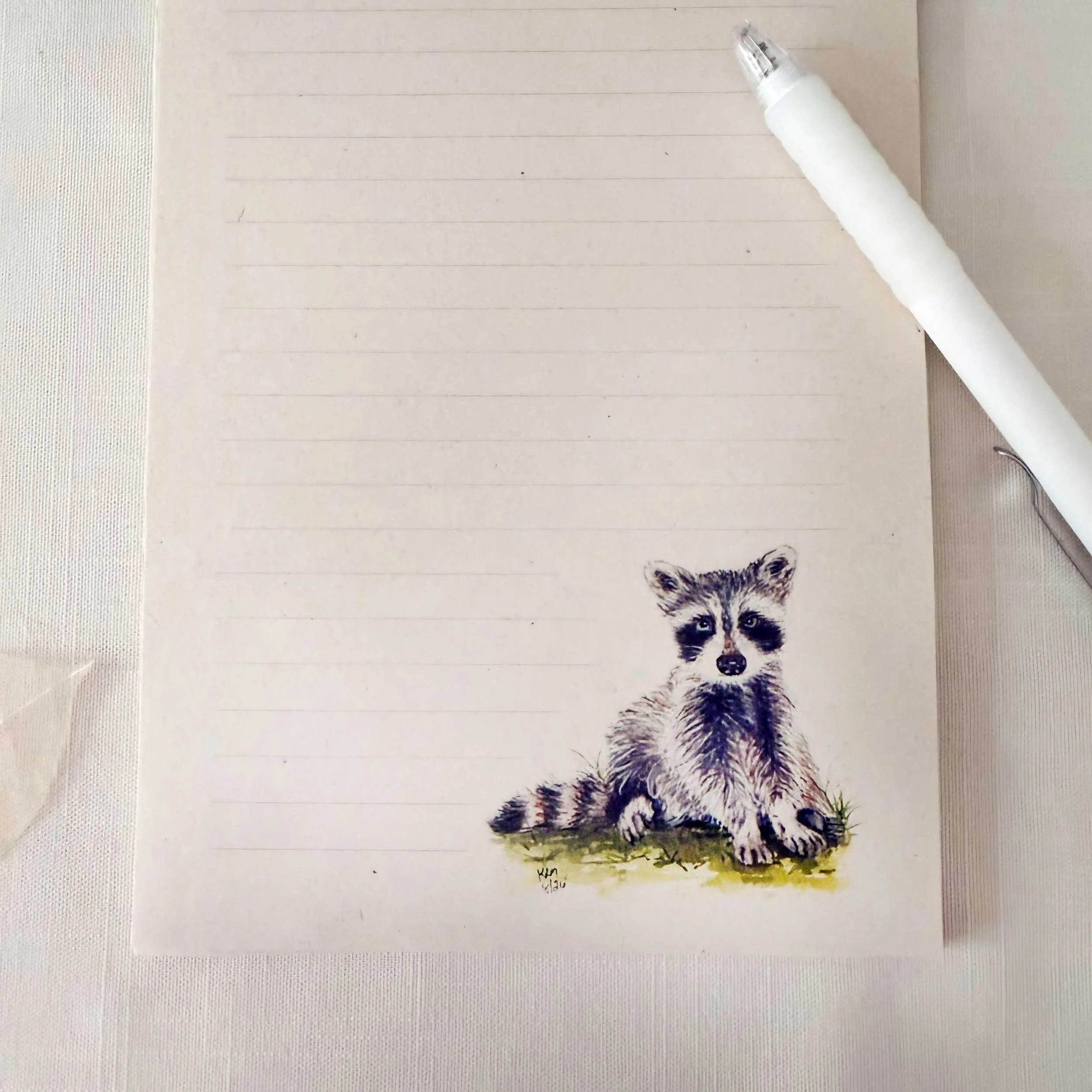 young-raccoon-grass-notepad_2.jpg