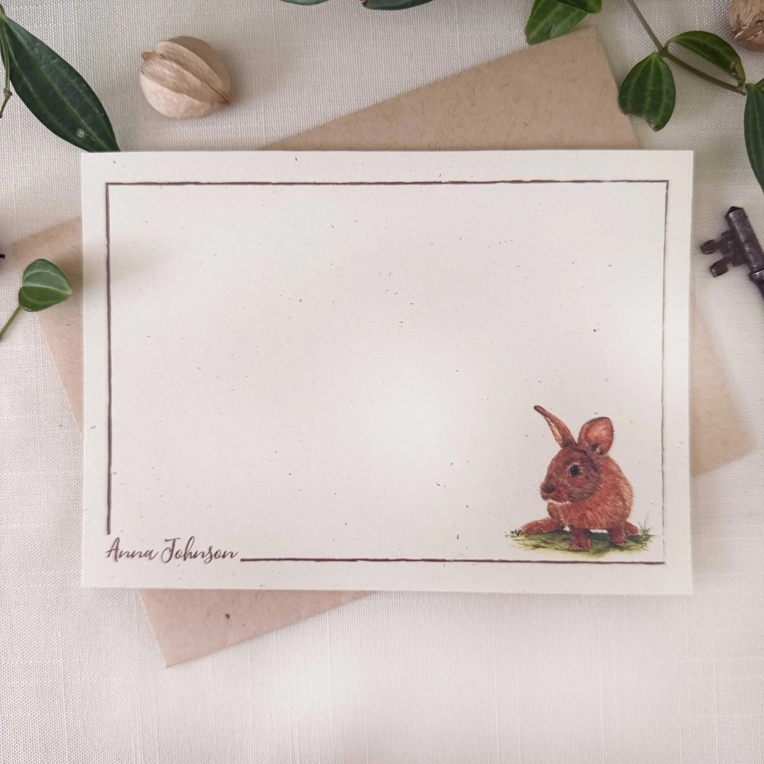 young-bunny-in-grass_notecard_1.jpg
