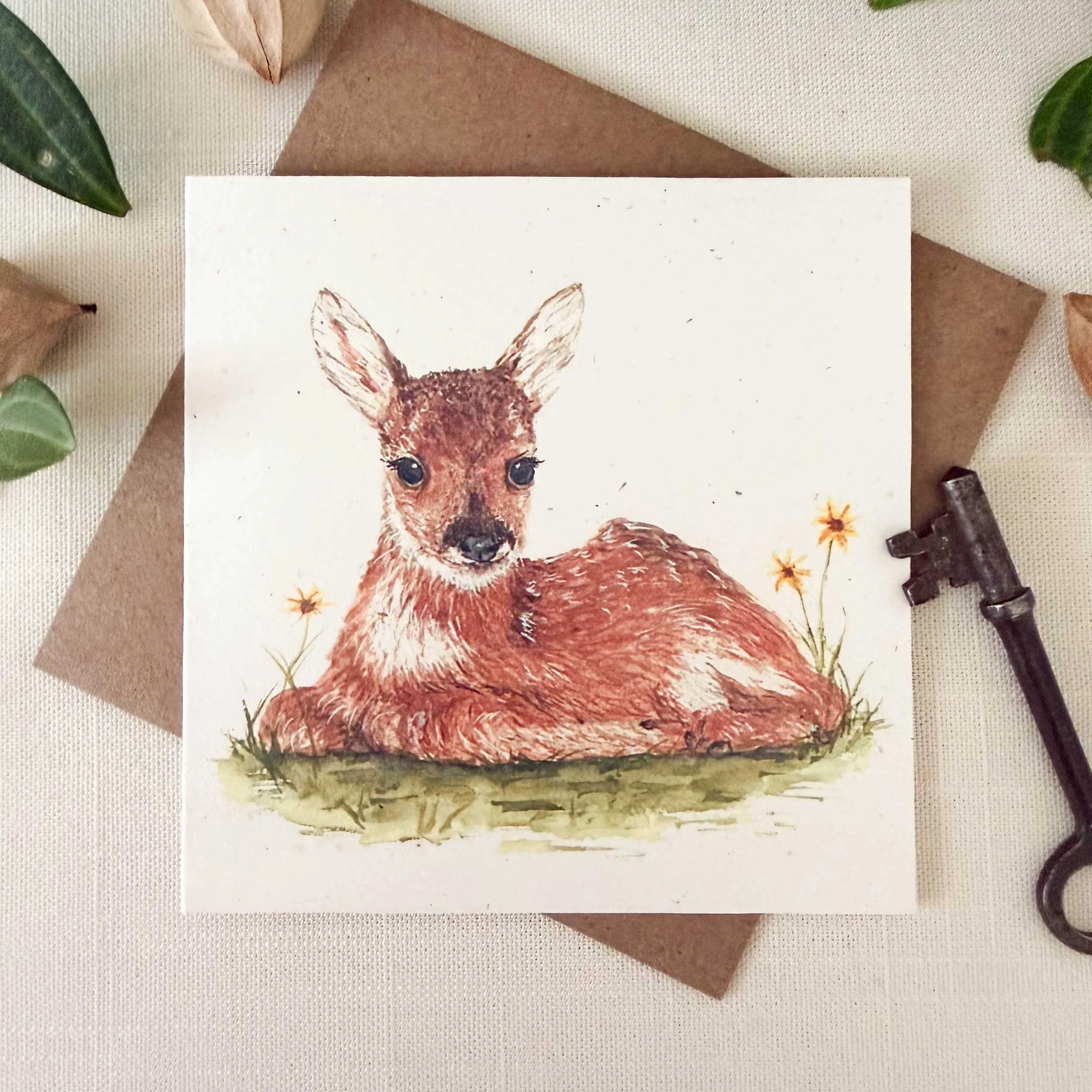 young-fawn-laying-down_mini-card_1.jpg