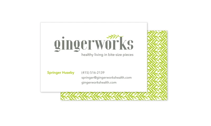 The pattern on the backs of these business cards uses the spring green frond from the logo to create a rich and attention-getting visual.