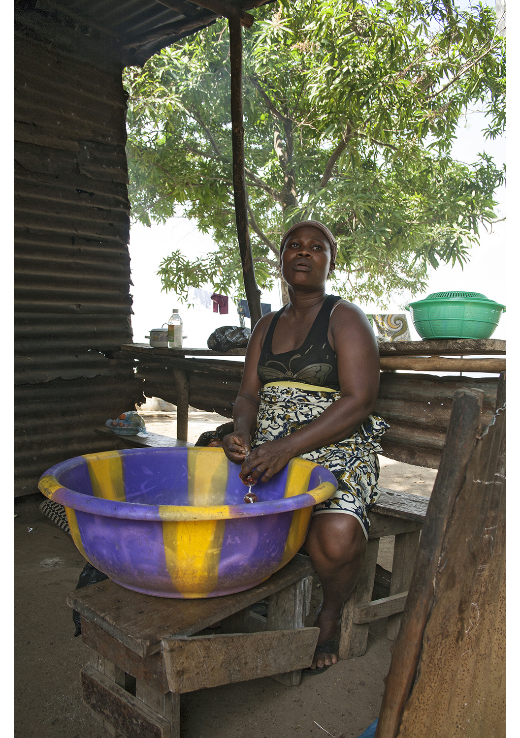 Woman Bagging Peppers, Robertsport, Liberia