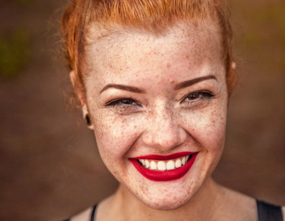 Happy face red hair 1000x778 gabriel-silverio-unsplash.jpg