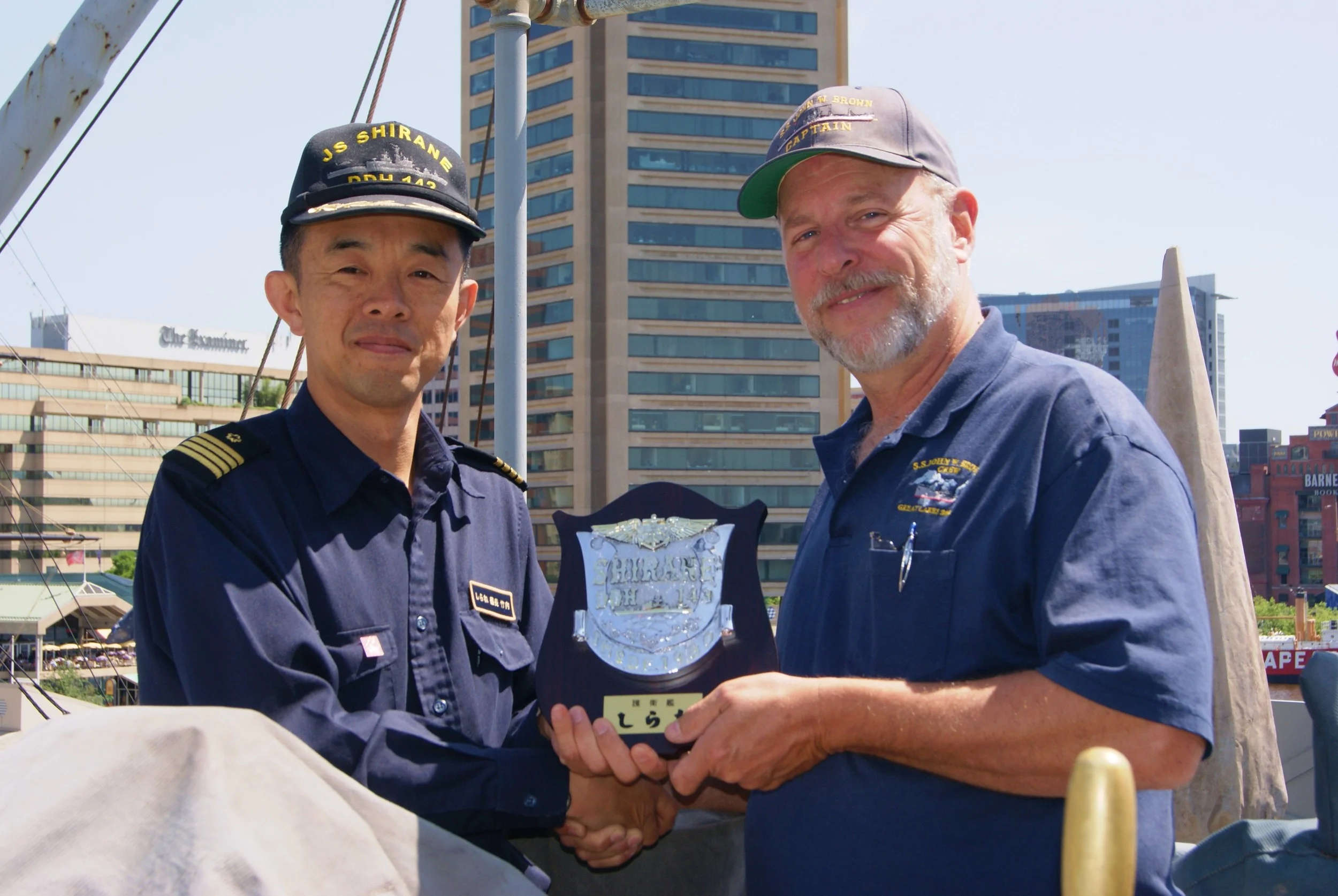 The Captain from the JS SHIRANE who along with his officers came for the short ride from Clinton Street to the Inner Harbor for the 2012 portion of Sailabration. Below they are visiting the flying bridge. JDS SHIRANE (DDG-143) is a destroyer in the Japan Maritime Self-Defense Force.