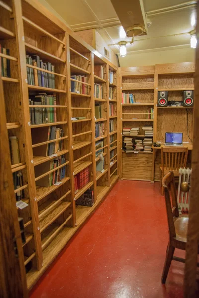 Looking into the Historical Library from the passageway, you can see most of two of the bulkheads, newly rebuilt by our volunteers.