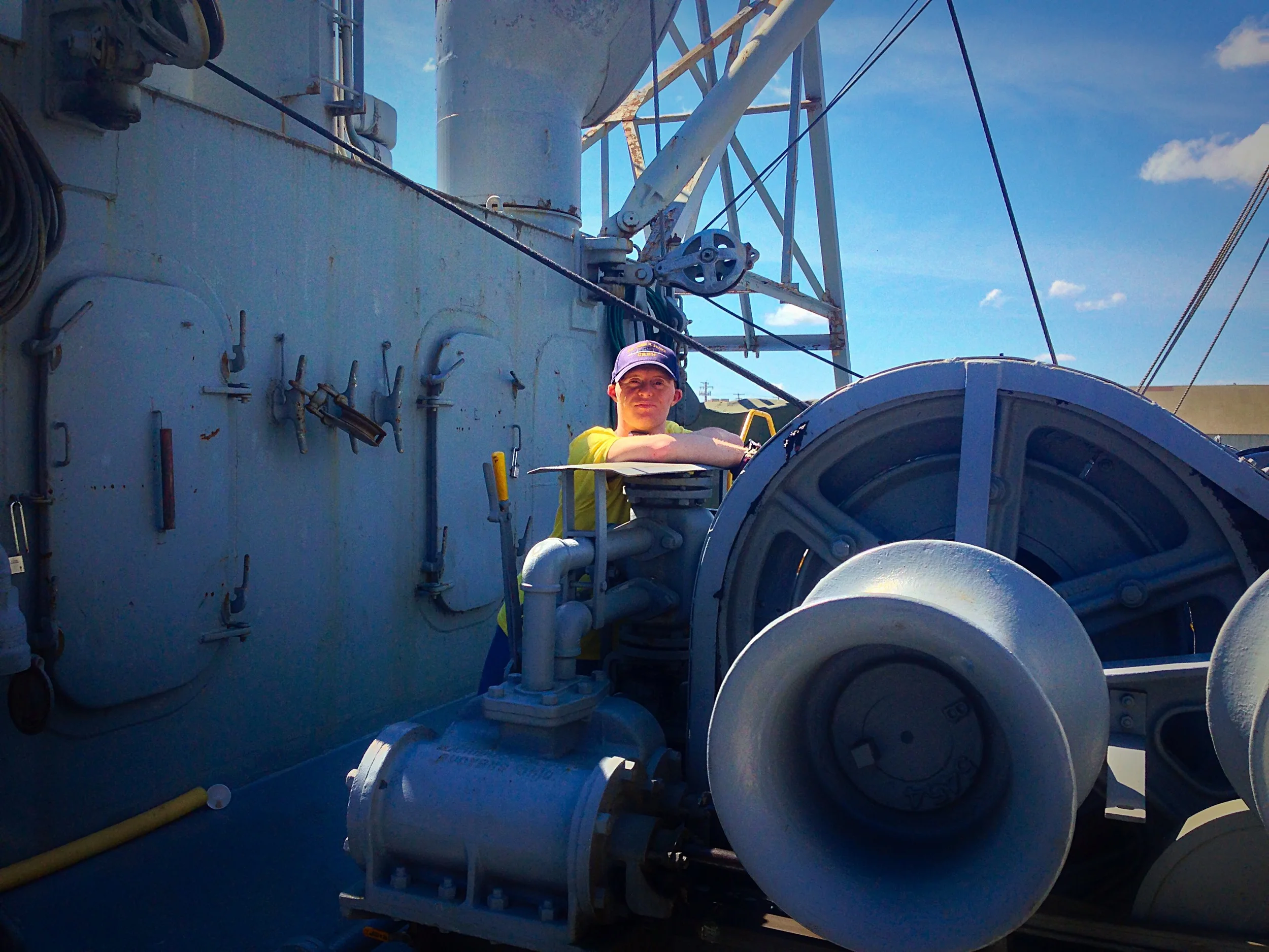 Howard's son, Andrew, is seen here during some down time between operating the ship's cargo gear. Andrew is also an active volunteer, and valued member of the crew. 