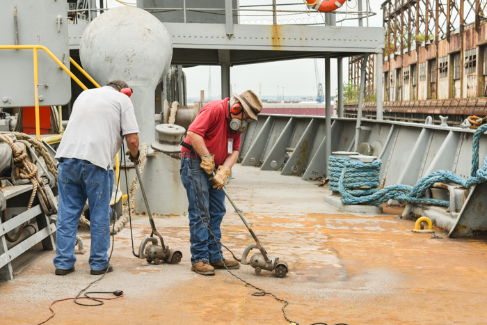 Deck crew were busy too getting things ready for the painting party.