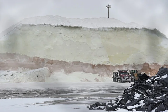 It only stays piled up until a storm is coming. When the forecast goes out the salt trucks line up to be loaded up. 