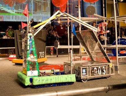 The 2007 Thunderchicken Robot didn't have a wrist-joint. The arm reoriented the claw during it's travel. I LOVE that linkage so much. Copioli is such a baller. I think it's technically a 6-bar, with a cross-over. Paul: How would you "classify" it?