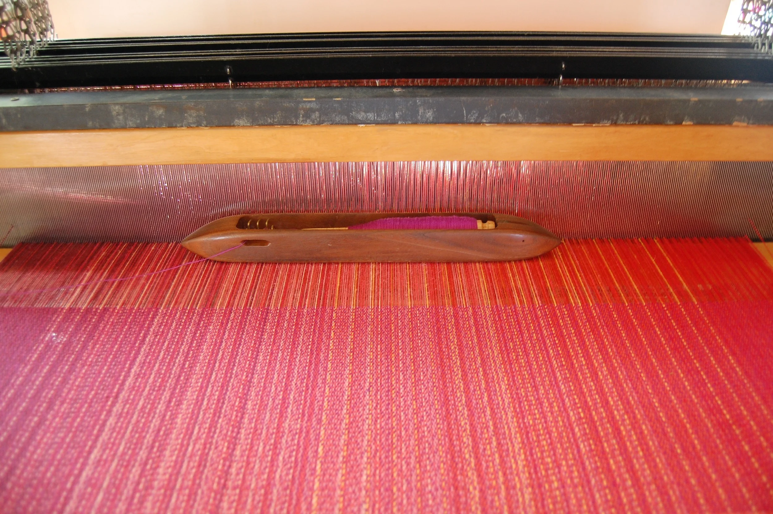 shown here with magenta cotton weft