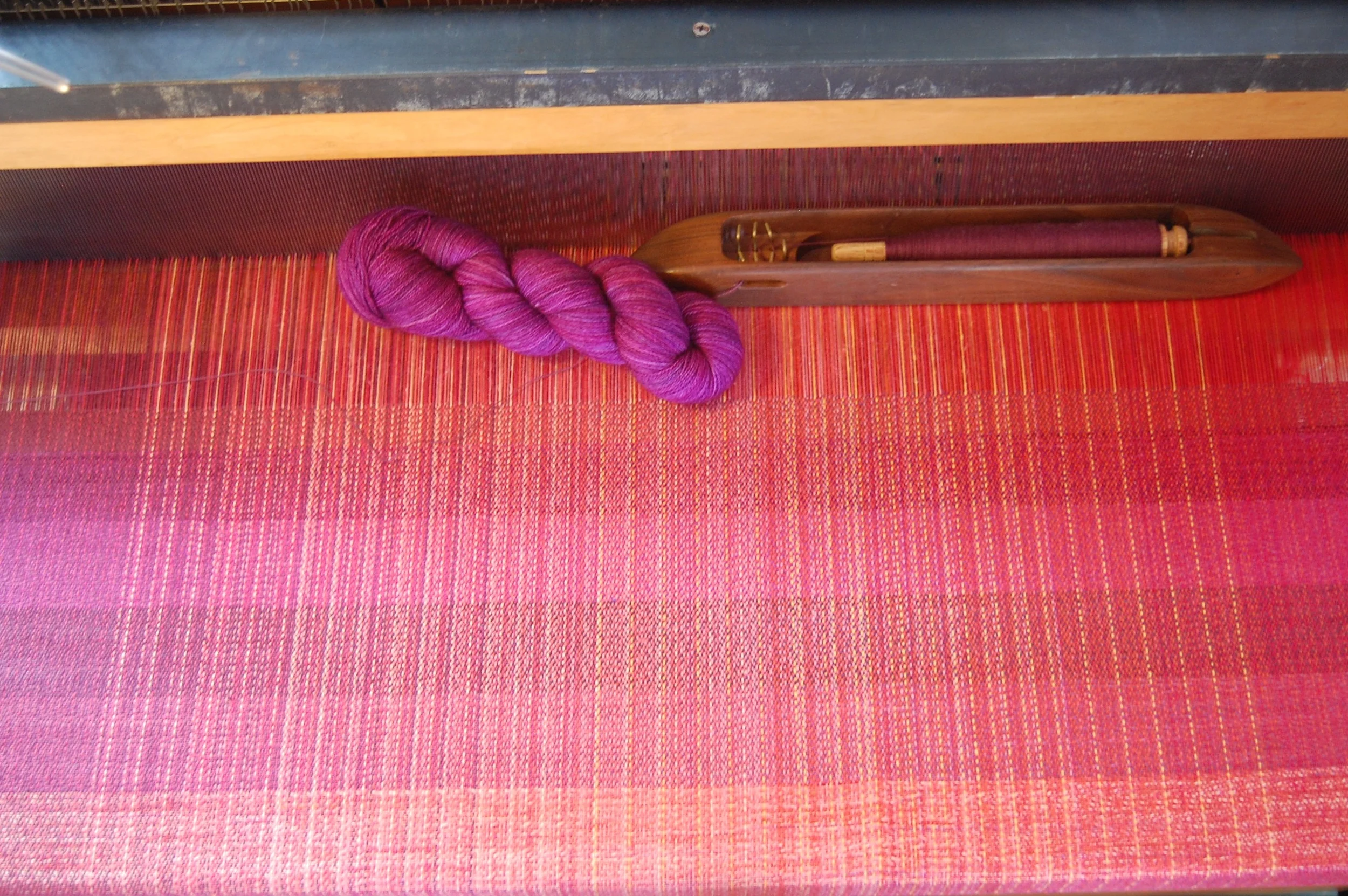 top two colors in woven sample show two additional wool wefts: hand-dyed superwash merino wool and fine organic merino wool
