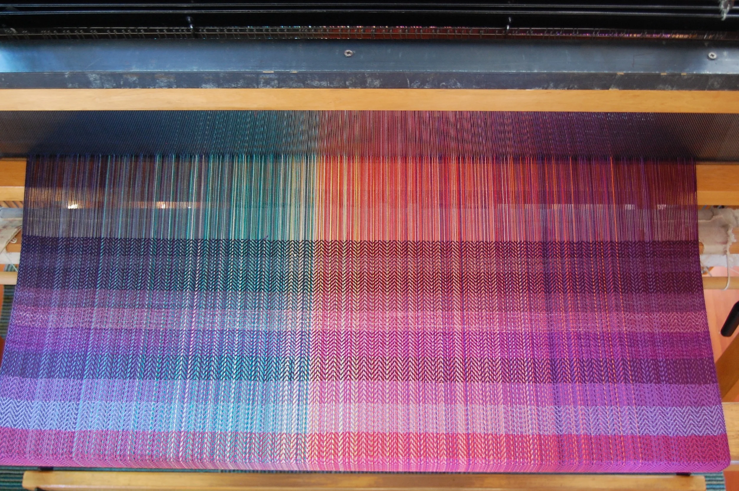 weft testing of variegated wefts - from the top: MT Clematis sw, MT purple basil sw, Phydeaux pomegranate merino/silk, Phydeaux mulled berries merino/silk, Phydeaux Bouganvillea sw (reserved)