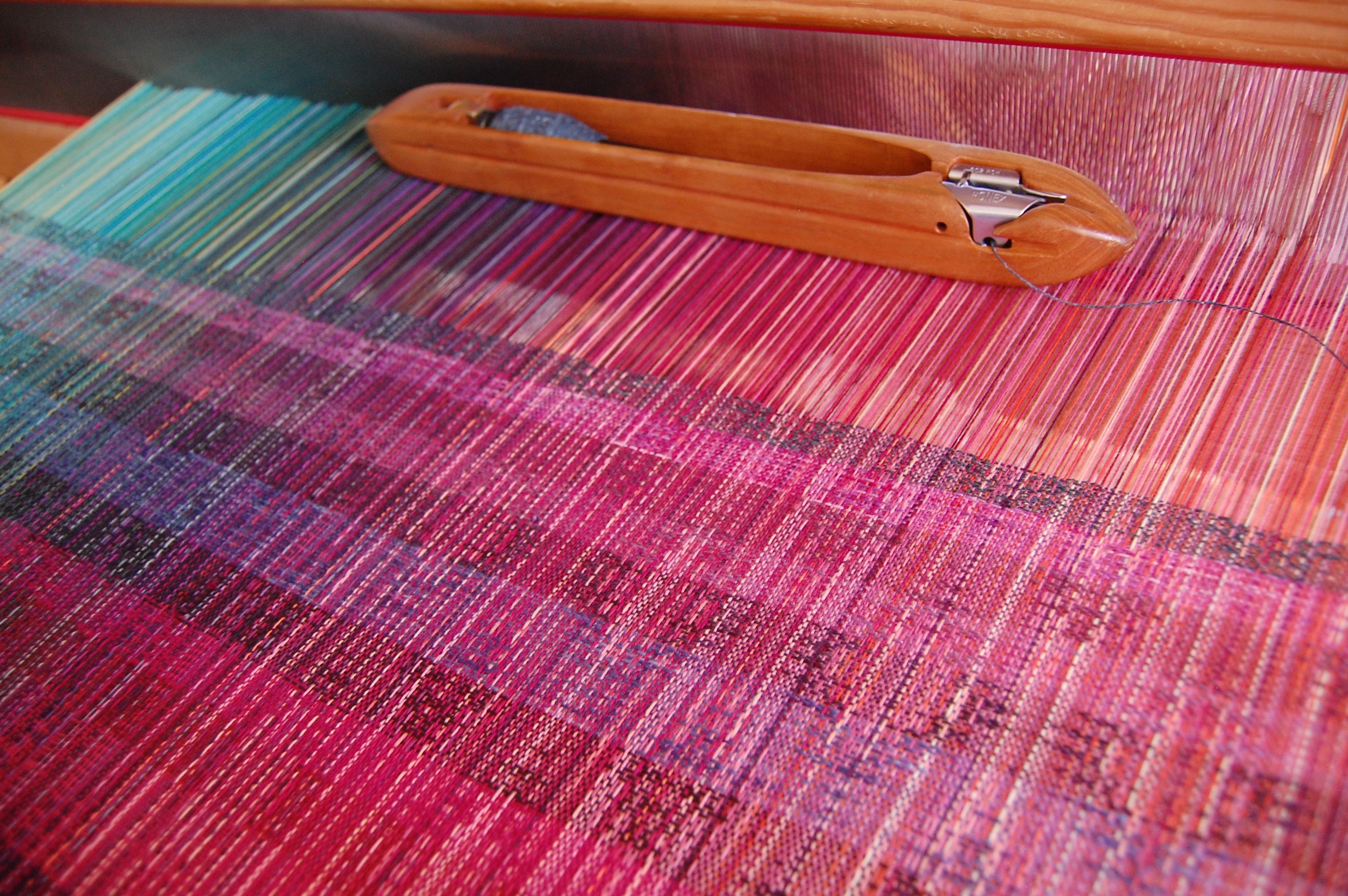 Tsumugi silk shown on top.