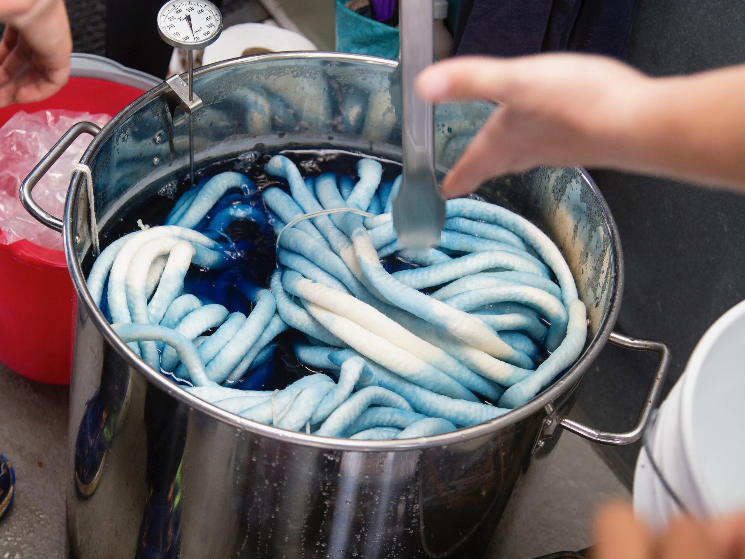 This photo shows the yarn after being placed in the dye bath.