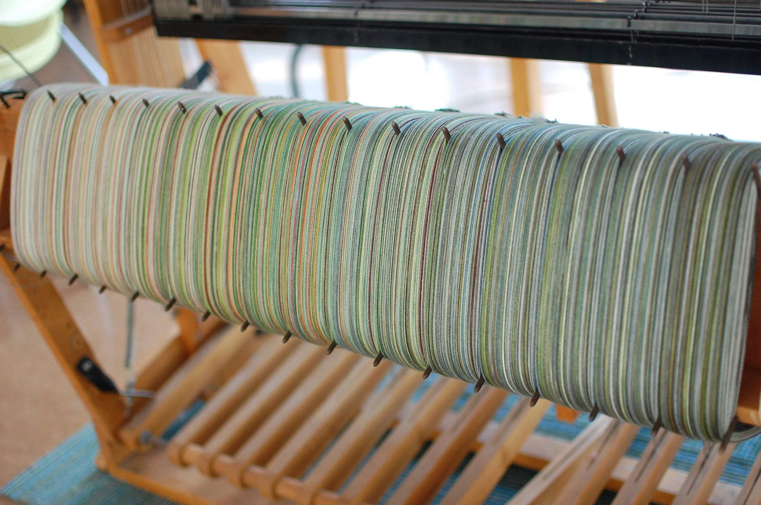 The warp - fully wound onto the beam